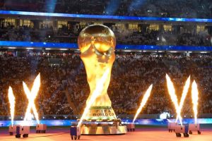 FIFA-World-Cup-trophy-surrounded-by-fireworks | Qatar 2022 FIFA World Cup Kicks Off with Great Expectations